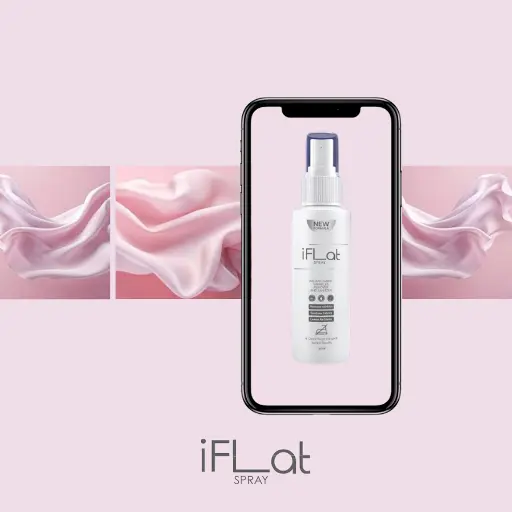 A smartphone advertising a new spray bottle product, set against a smooth silky pink fabric background.